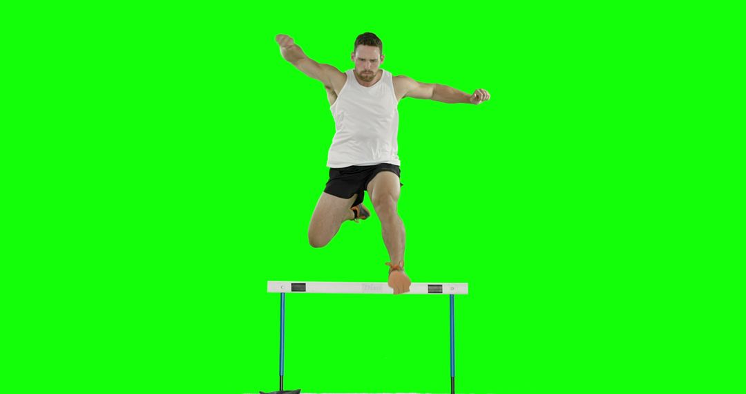 Male Athlete Jumping Over Hurdle on Green Screen Background - Free Images, Stock Photos and Pictures on Pikwizard.com