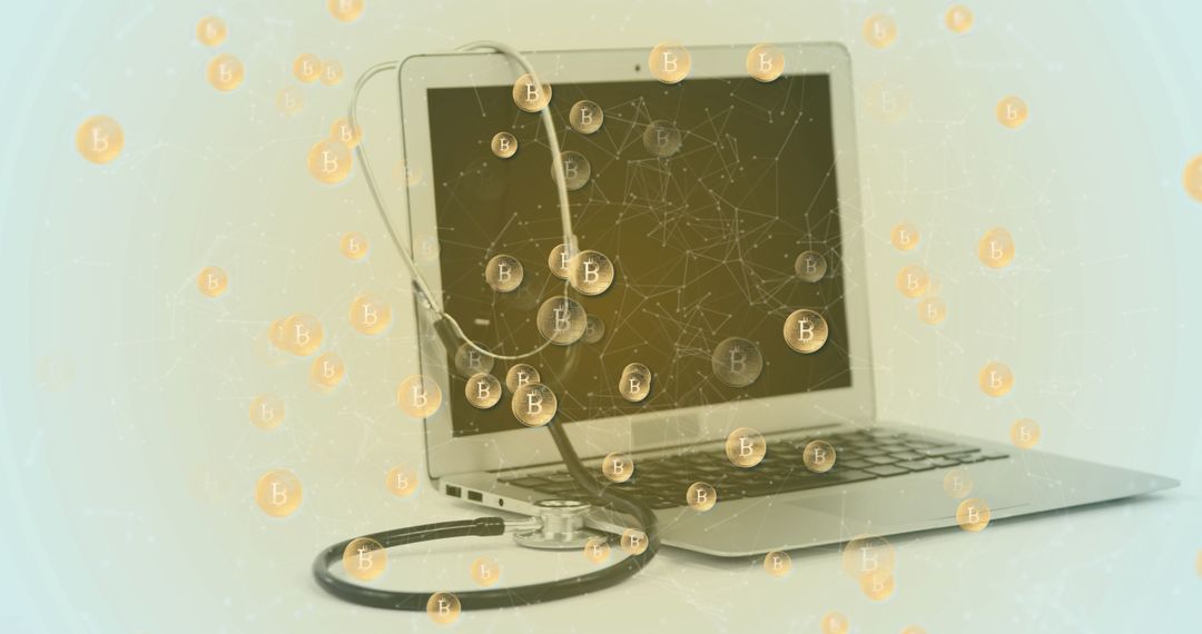 Bitcoin Symbols Floating Over Laptop and Stethoscope in Healthcare Concept