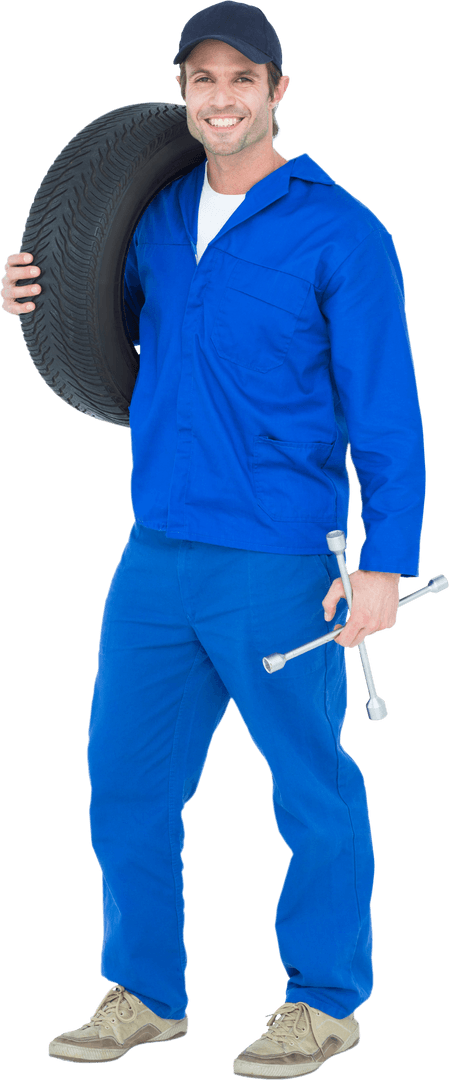 Smiling Mechanic in Blue Uniform Holding Spare Tire and Tools Transparent