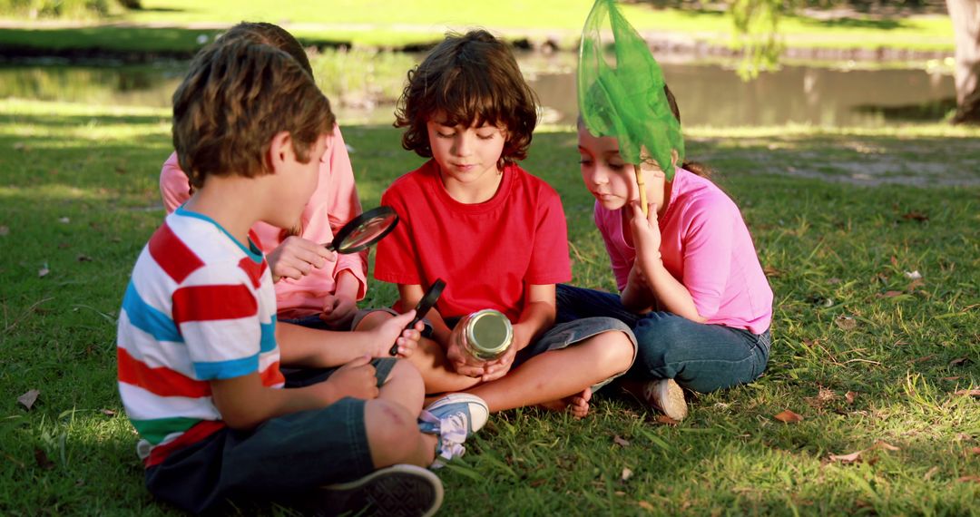 Children Exploring Nature with Magnifying Tools in Park - Free Images, Stock Photos and Pictures on Pikwizard.com