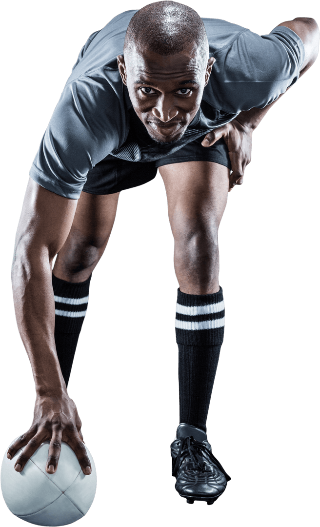 Smiling Rugby Player Holding White Ball on Transparent Background