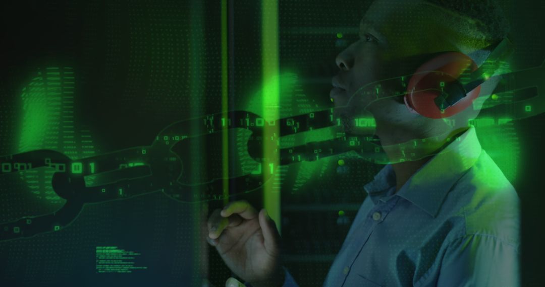 African American Technician Analyzing Digital Data in Server Room