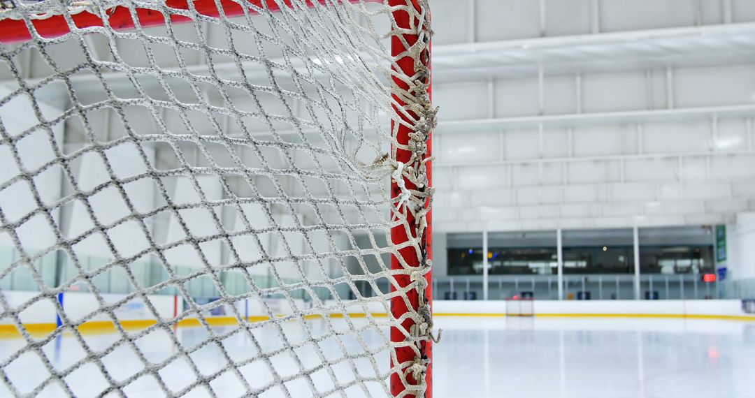 Empty Ice Hockey Rink with Focus on Goal Net - Free Images, Stock Photos and Pictures on Pikwizard.com