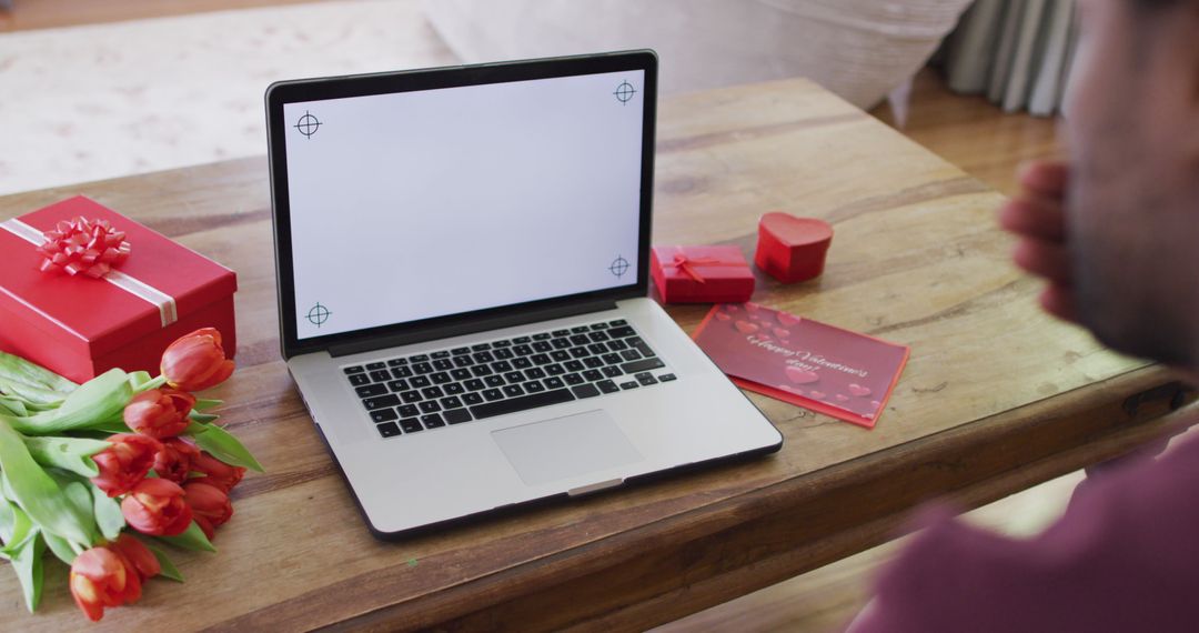 Romantic Setup with Laptop for Valentine's Day Call