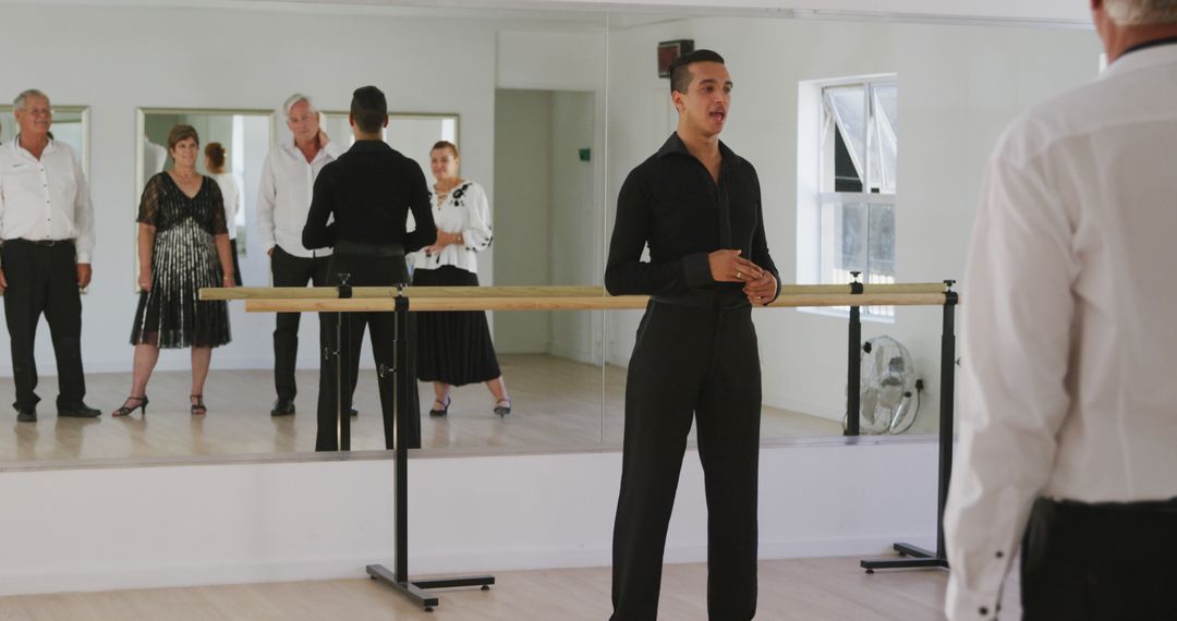 Instructor Leading Dance Class with Senior Participants - Free Images, Stock Photos and Pictures on Pikwizard.com