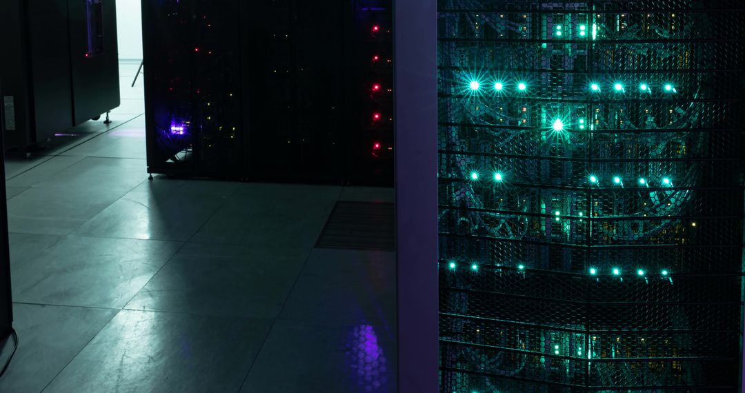 Empty Corridor in Data Center with Servers Illuminated by LED Lights