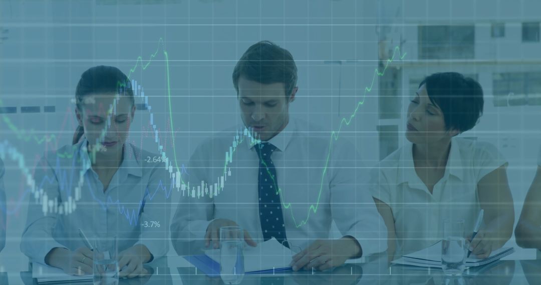 Business Professionals Analyzing Data with Financial Chart Overlay