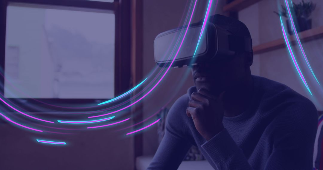 Man in VR Headset Experiences Virtual Reality with Neon Light Effects