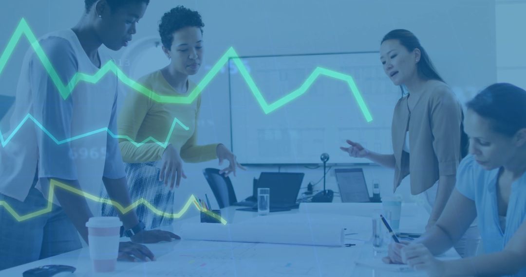 Diverse Colleagues Collaborate on Financial Data Analysis