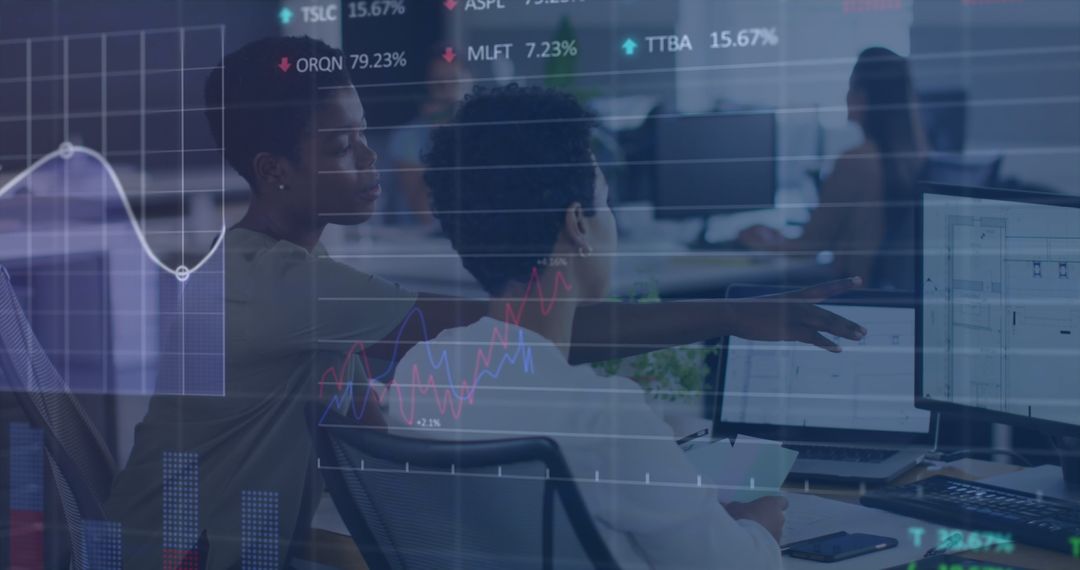 Coworkers Analyzing Financial Data with Technology Overlay