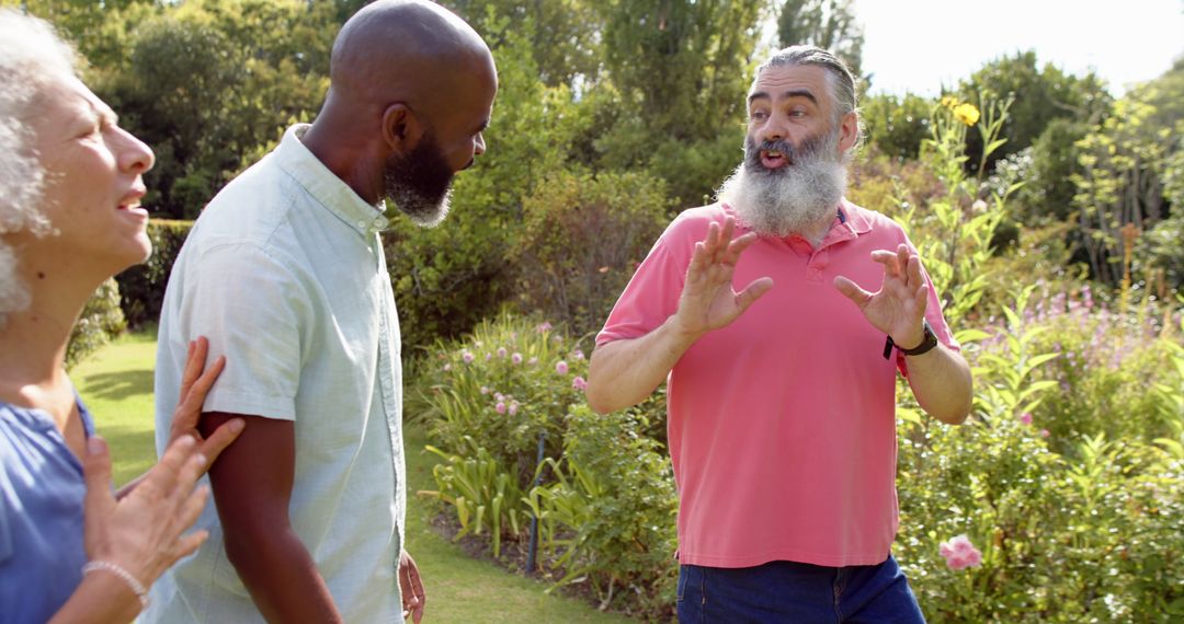 Senior Friends Enjoying Outdoor Conversation in Peaceful Garden