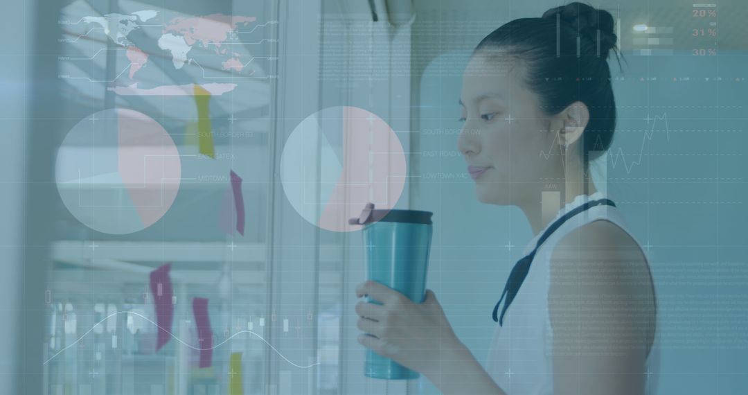 Businesswoman Analyzing Data on a Transparent Screen with a Coffee Cup - Free Images, Stock Photos and Pictures on Pikwizard.com