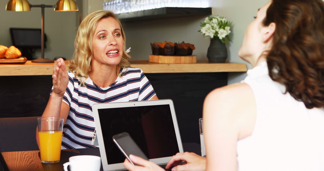 Friendly Conversations in Cozy Café Environment