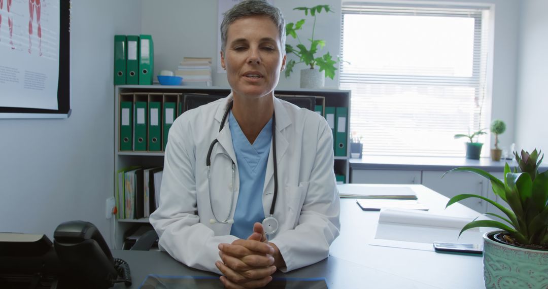 Female Doctor in Medical Office During Video Call Conference - Free Images, Stock Photos and Pictures on Pikwizard.com