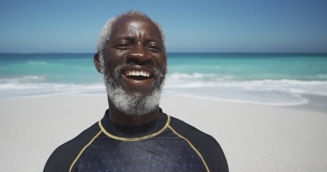 Elderly Man Smiling on Tropical Beach - Free Images, Stock Photos and Pictures on Pikwizard.com