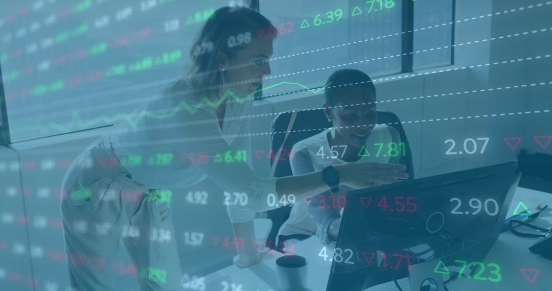 Diverse Team Analyzing Financial Data on Computer Screens