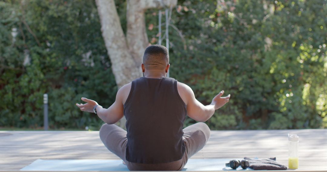 Man Practicing Outdoor Yoga and Meditation in Backyard - Free Images, Stock Photos and Pictures on Pikwizard.com