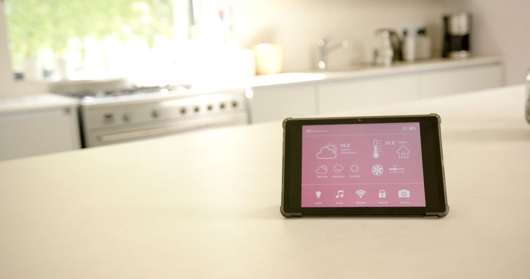 Smart Home Tablet with Control Interface on Kitchen Counter