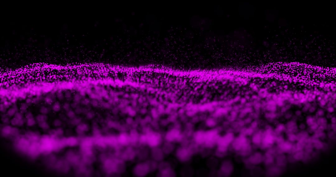Mesmerizing Purple Particles in Hypnotic Motion on Black Background