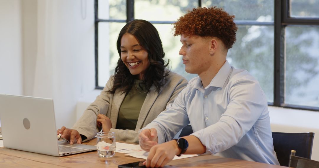 Diverse Team Collaborating on Business Project in Office Meeting