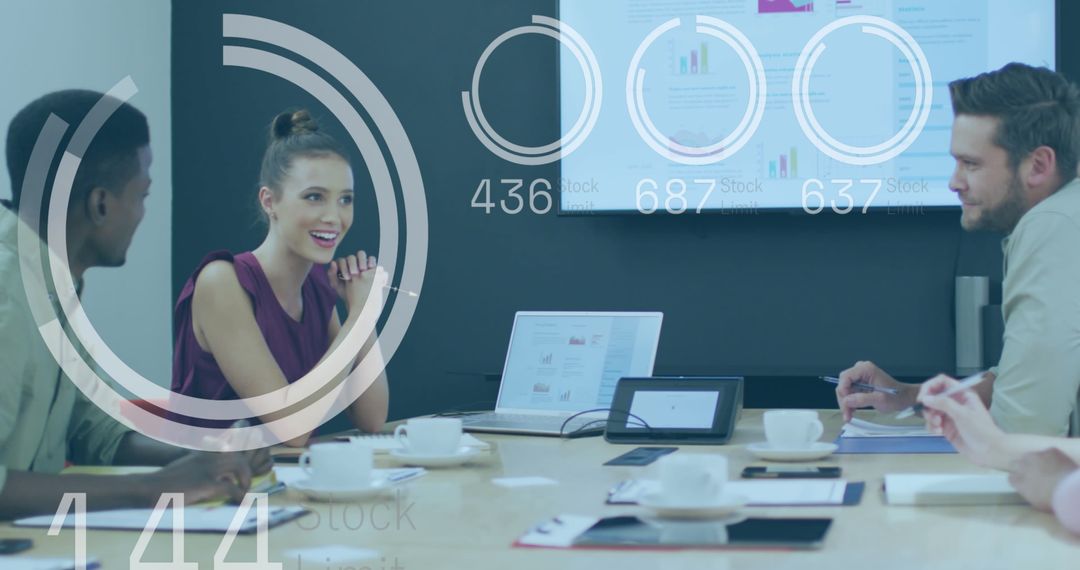 Business Team Analyzing Data in Modern Meeting Room