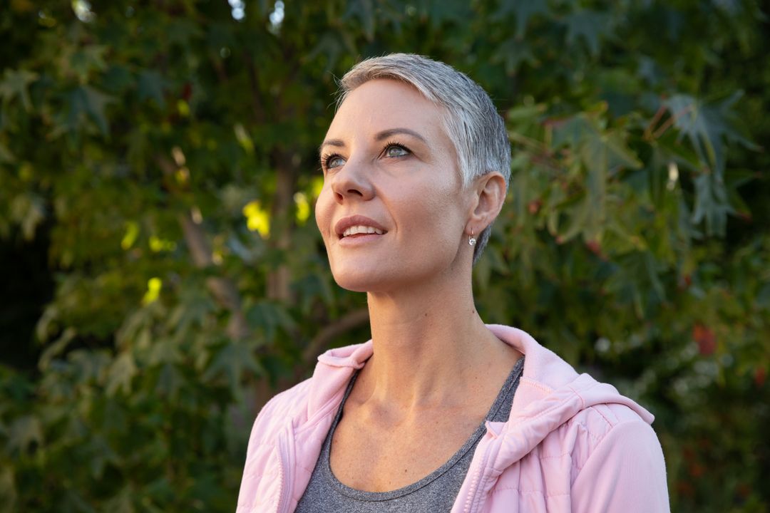 Woman in Nature Embracing Serenity and Vitality in Woodland