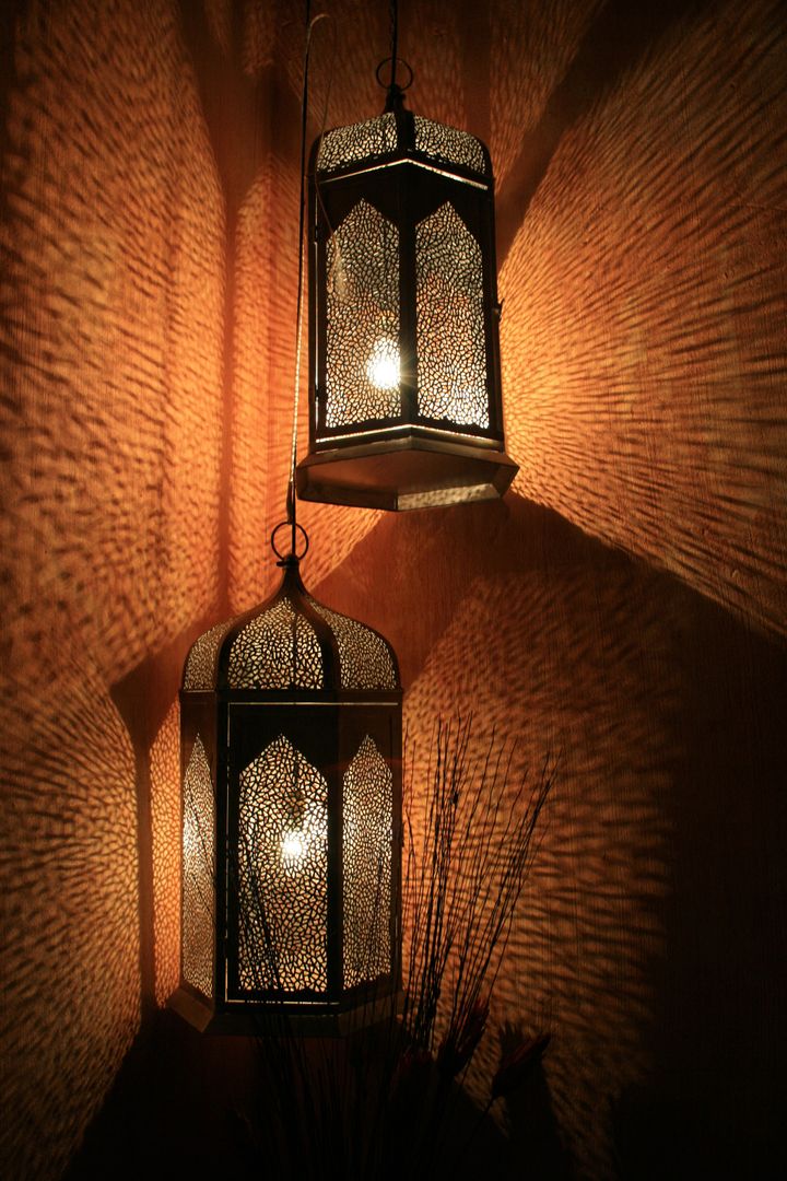 Dimly Lit Hanging Moroccan Lanterns Casting Intricate Shadows - Free Images, Stock Photos and Pictures on Pikwizard.com