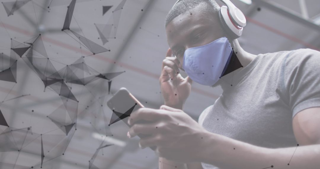 Man Streaming Music on Smartphone while Exercising at Gym