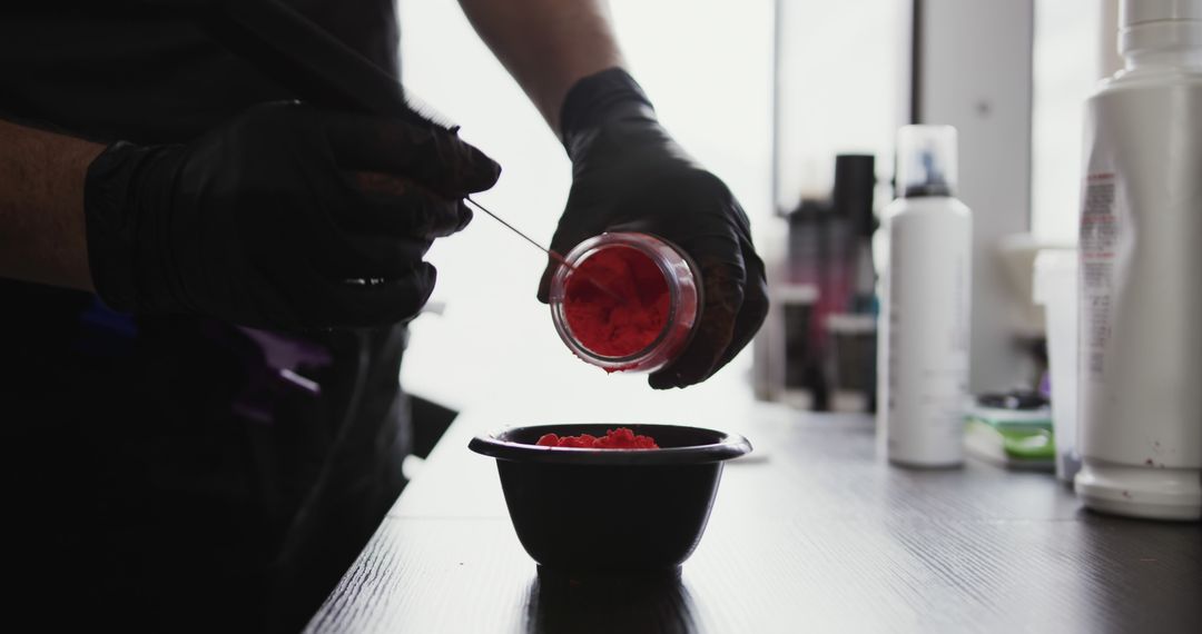 Hairdresser Mixing Vibrant Red Hair Dye in Salon - Free Images, Stock Photos and Pictures on Pikwizard.com