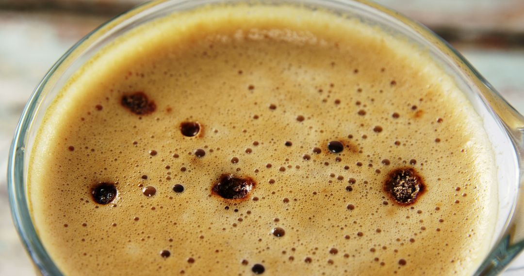 Close-Up of Fresh Frothy Espresso Coffee Drink in Glass - Free Images, Stock Photos and Pictures on Pikwizard.com