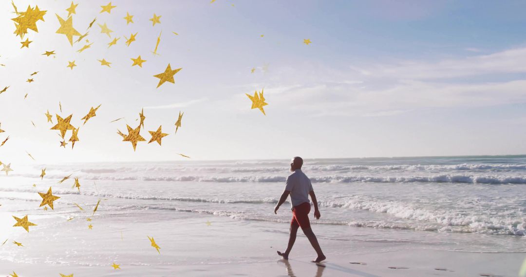 Man Walking Along Seaside Beach with Golden Star Confetti