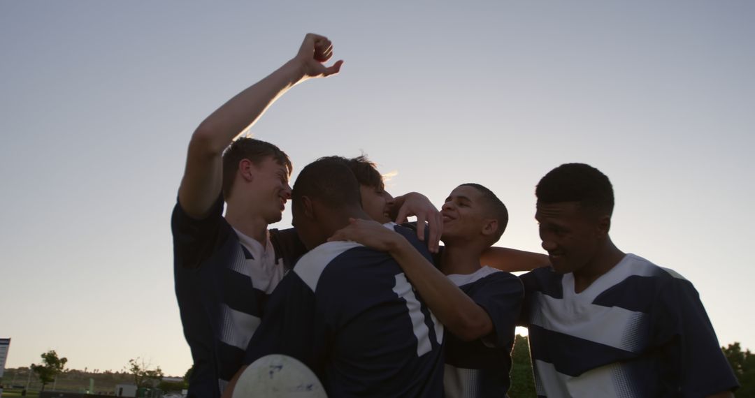 Happy Teenage Soccer Players Celebrating Victory on Field - Free Images, Stock Photos and Pictures on Pikwizard.com