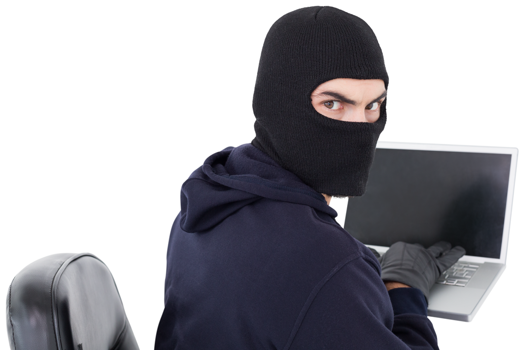 Hacker in Black Hoodie Holding Laptop with Intense Gaze on Transparent Background - Download Free Stock Images Pikwizard.com