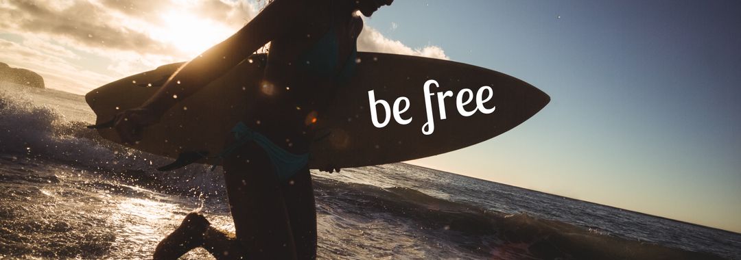 Surfer's silhouette at sunset promoting adventure and freedom