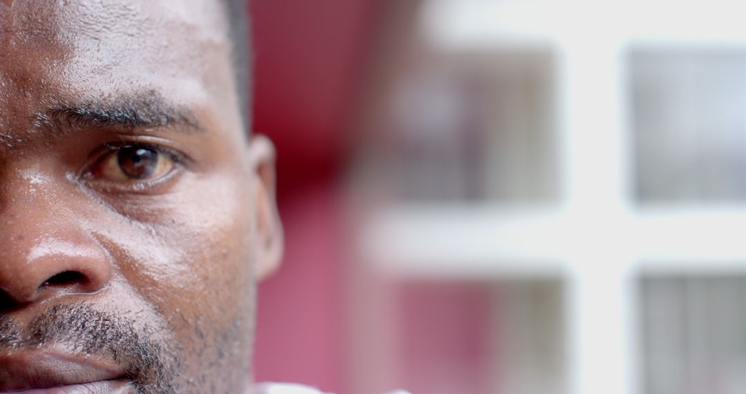 Close-Up of Thoughtful African American Man with Contemplative Expression