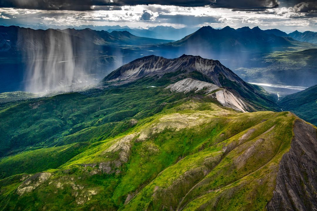 Stunning Mountain Landscape with Rainfall in Distance - Free Images, Stock Photos and Pictures on Pikwizard.com