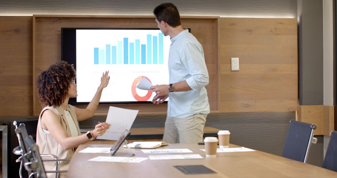 Team Collaboration Analyzing Data in Modern Office Environment