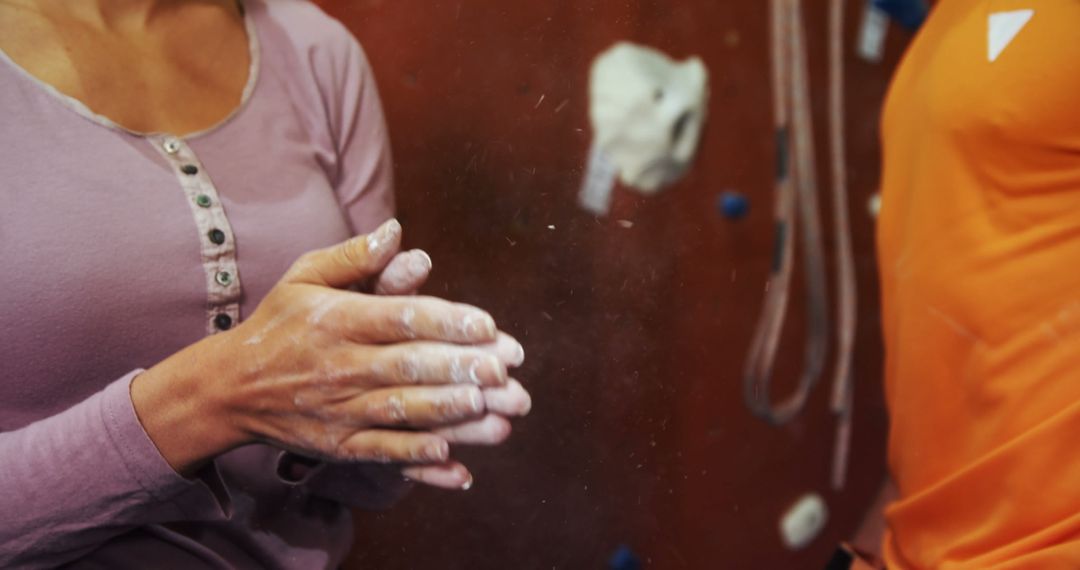 Female Rock Climber Applying Chalk on Hands - Free Images, Stock Photos and Pictures on Pikwizard.com