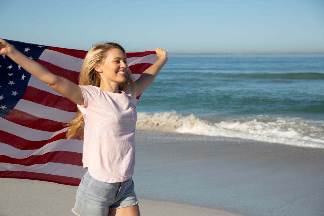 Woman Running with American Flag on Beach - Free Images, Stock Photos and Pictures on Pikwizard.com