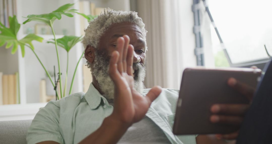 Image of african american senior man using tablet - Free Images, Stock Photos and Pictures on Pikwizard.com