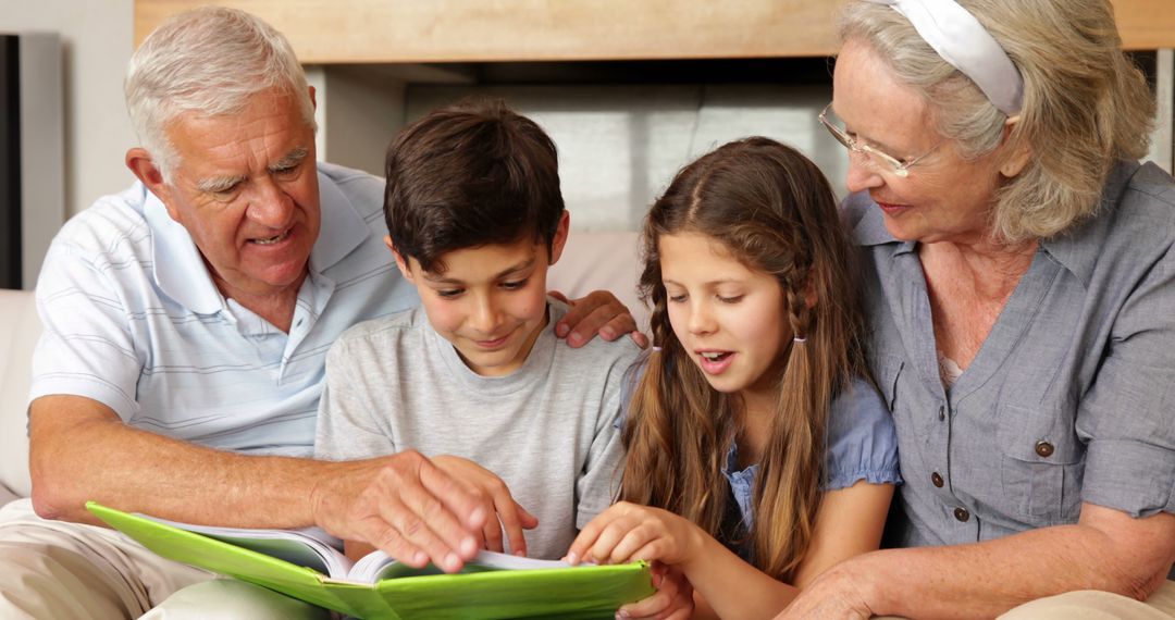 Grandparents Reading Story to Happy Grandchildren at Home - Free Images, Stock Photos and Pictures on Pikwizard.com