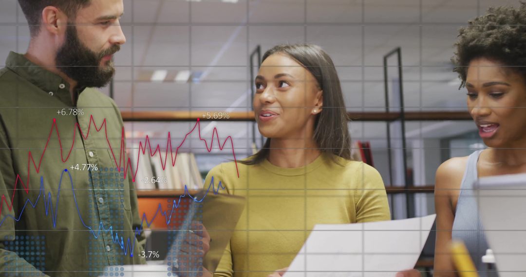 Financial Team Analyzing Data Charts in Modern Workspace