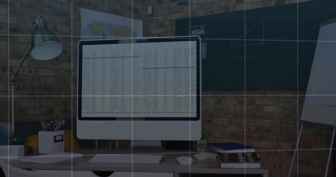 Modern Home Office Workspace with Computer Displaying Spreadsheet