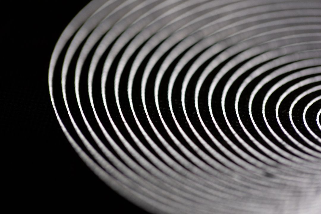 Abstract Concentric Circles on Dark Background