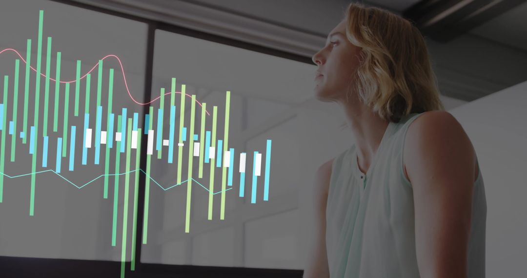 Business Professional Analyzing Data on Sleek Office Display
