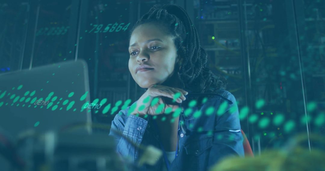 Woman Analyzing Data in Cybersecurity Server Room