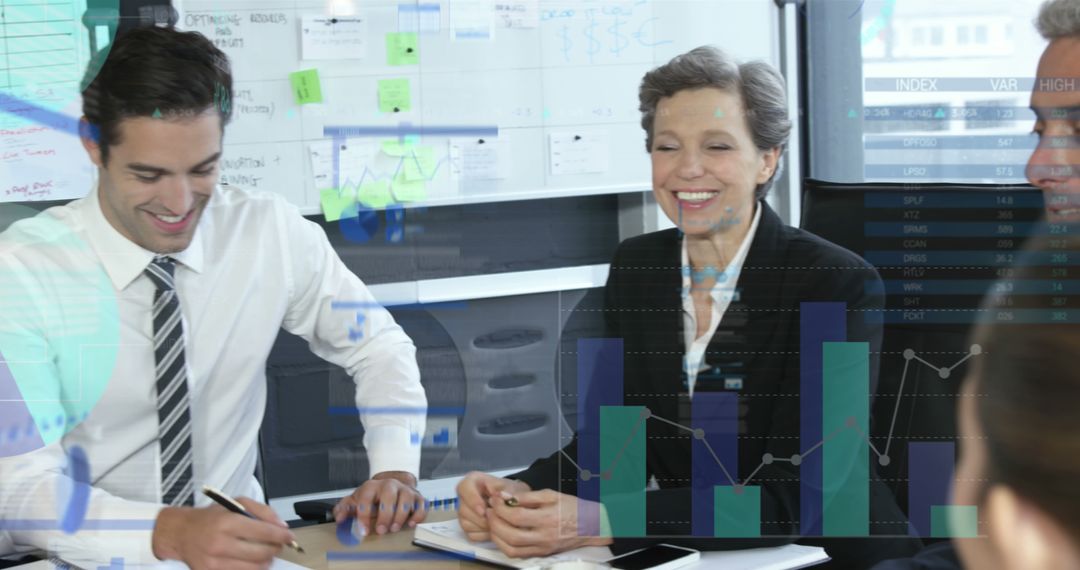 business team analyzing statistical data and technology interface - Free Images, Stock Photos and Pictures on Pikwizard.com