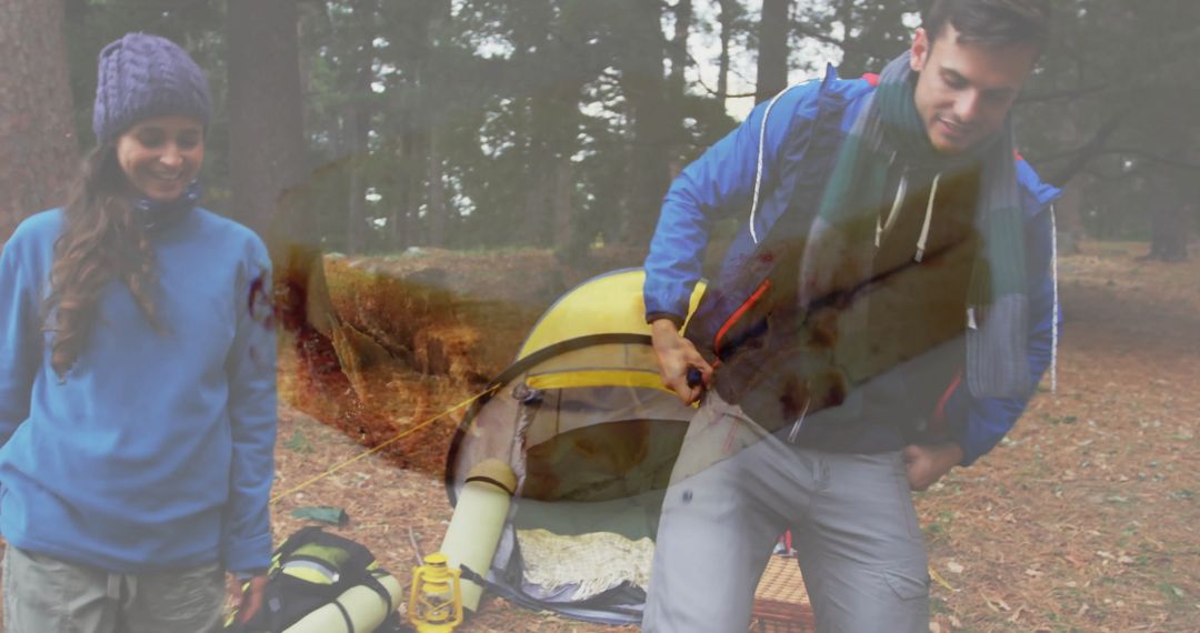 Couple Pitching Tent in Pine Forest Expedition