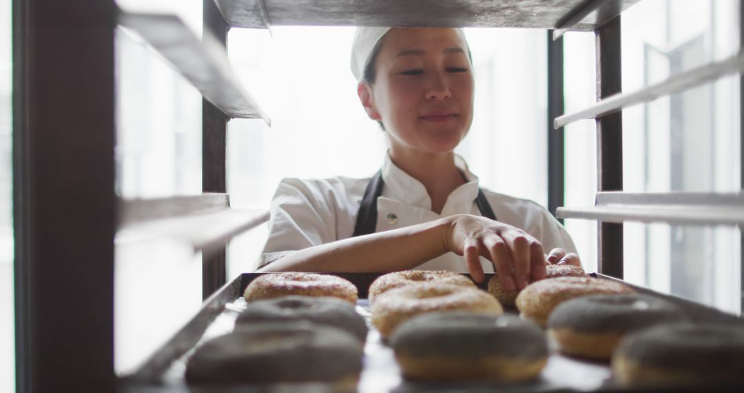 Pastry Chef Preparing Fresh Donuts in Bakery - Free Images, Stock Photos and Pictures on Pikwizard.com