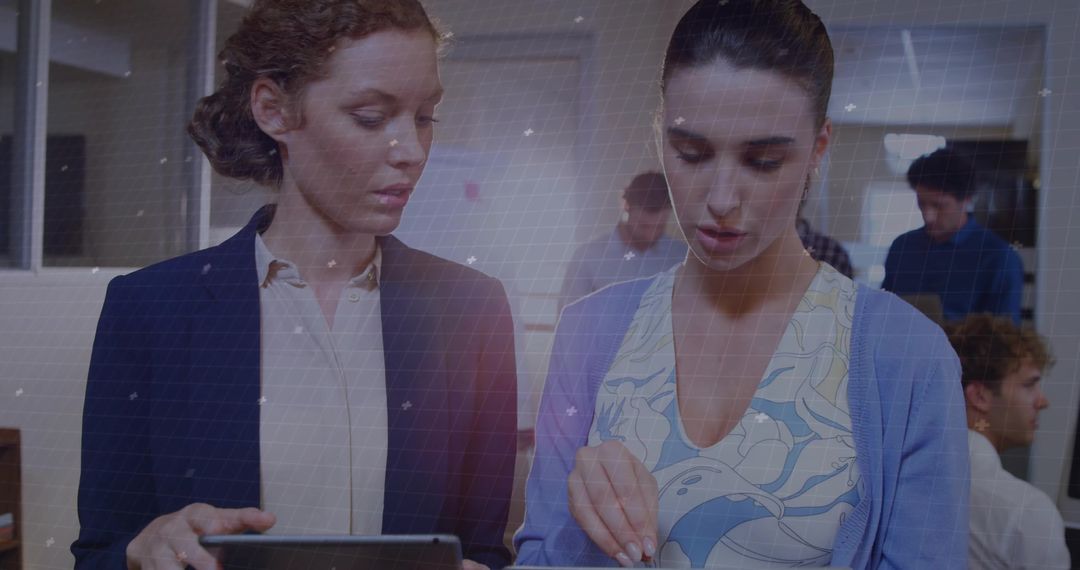 Professional Colleagues Collaborating in Contemporary Open Office Environment